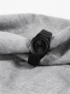 ValoraTime Pure watch lifestyle photograph on a gray linen surface.