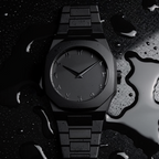 ValoraTime Maktub watch atmospheric product photograph with a water-droplet effect.